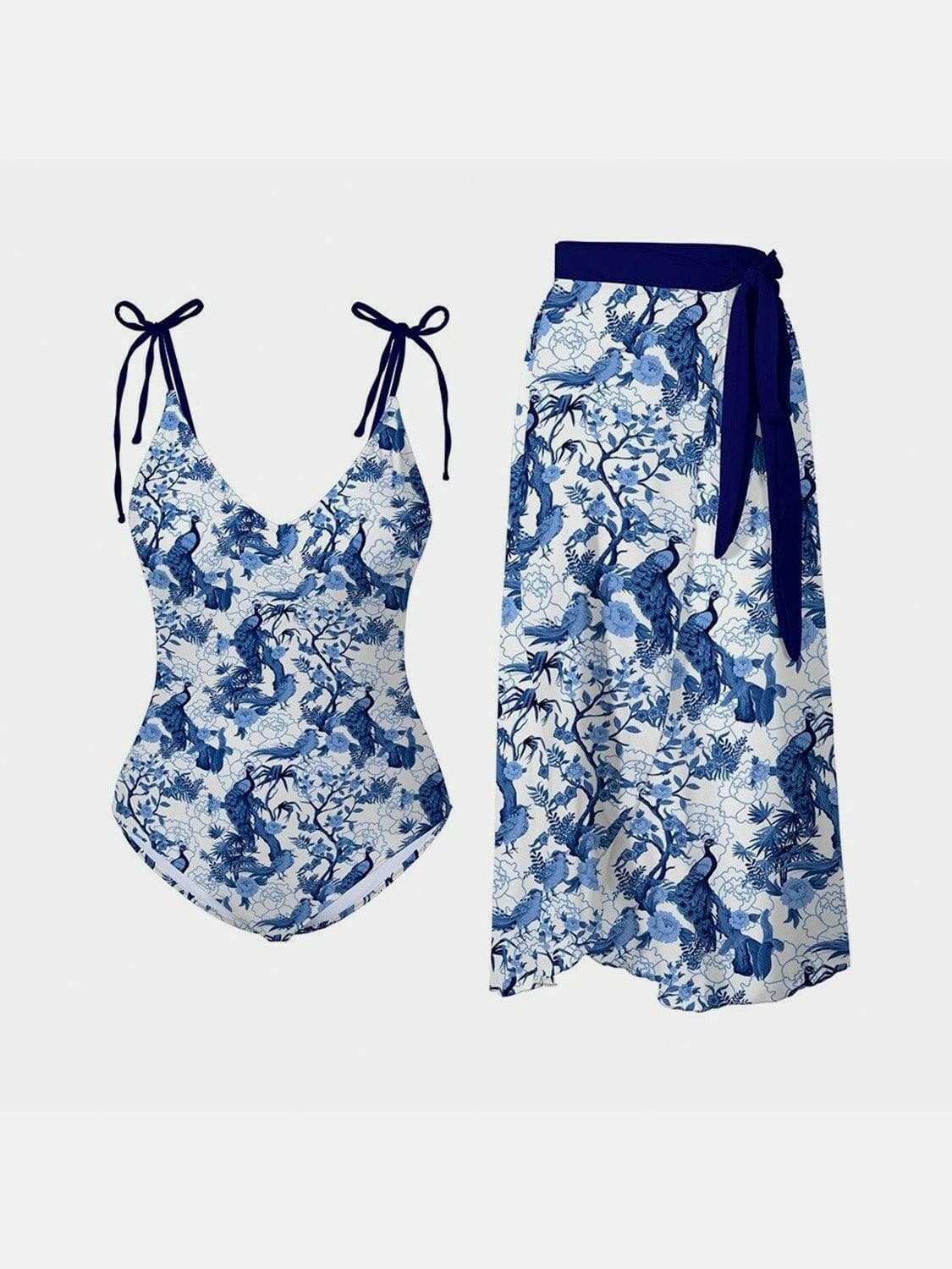 Summer chic printed tie shoulder bikini set with matching skirt.