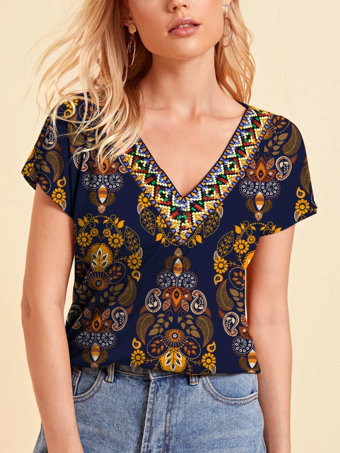 Vibrant Printed V-Neck Tee for Women with eye-catching design, short sleeves, and floral pattern.