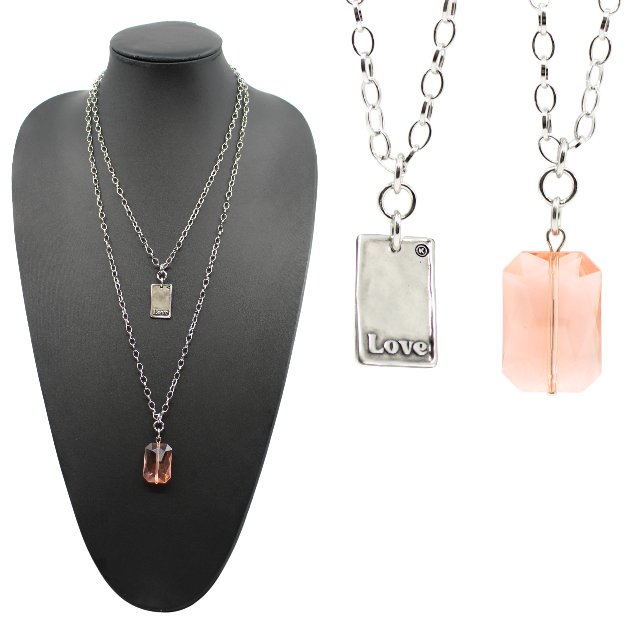 Close-up of the Katia Designs Love Heart Original Lite Necklace pendant, showcasing its smooth, polished silver finish.