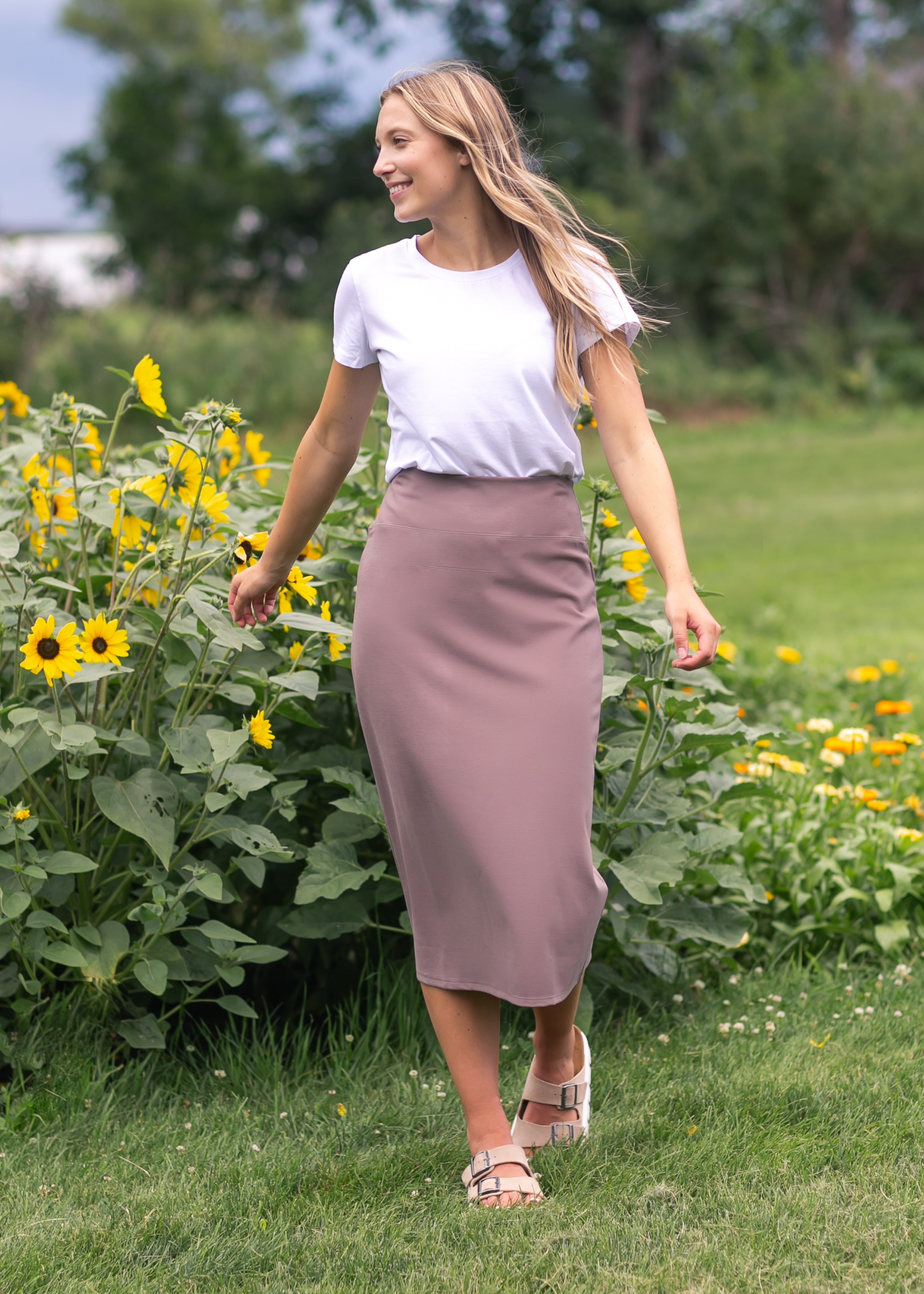 Inherit Co. Quinn Midi Skirt, 31 inch, shown from a side angle, emphasizing its comfortable fit and versatile silhouette.
