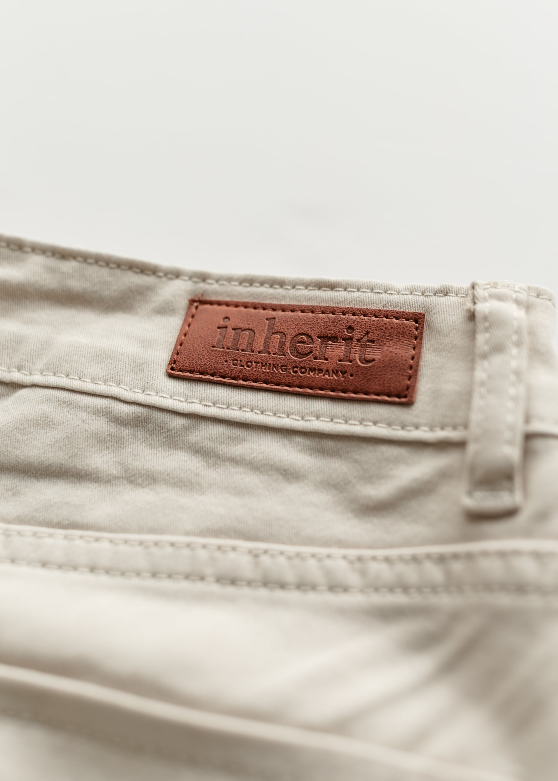 Detail of Inherit Co. Remi Cloud Denim Midi Skirt hem, showcasing the flow of the A-line style.