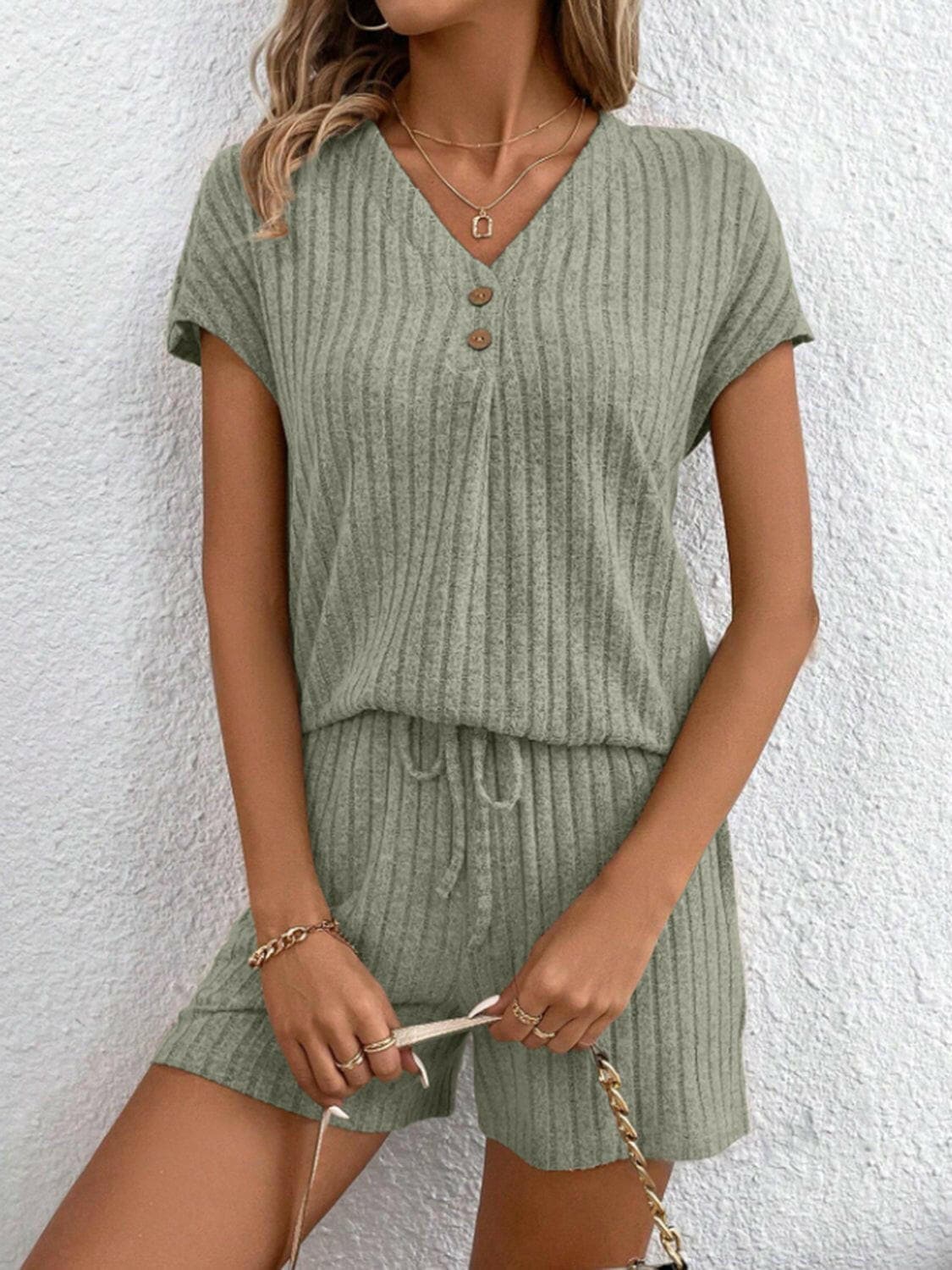 Ribbed V-Neck Top and Shorts EnsembleRibbed V-Neck Top and Shorts Ensemble
 Upgrade your casual wardrobe with our Ribbed V-Neck Top and Shorts Ensemble, a perfect blend of style and comfort for various Love Salve -Neck Topjust arrived