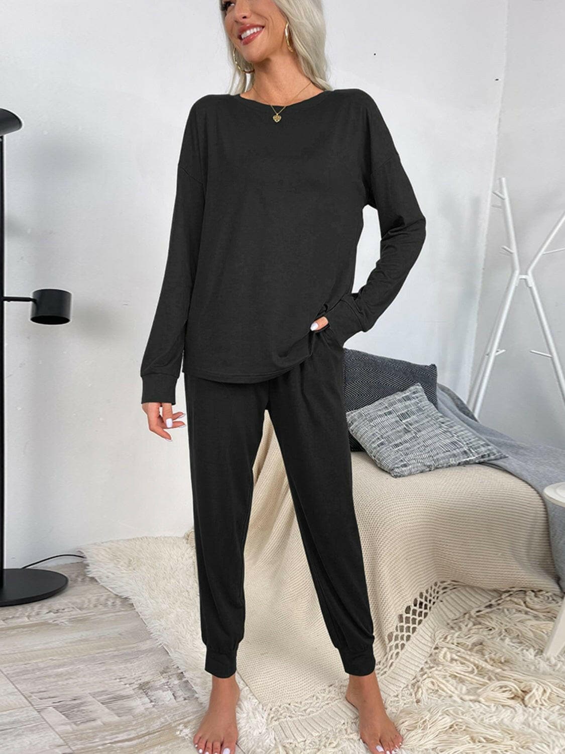 Lounge in Style: Round Neck Top and Drawstring Pants SetIndulge in Comfort and Style
 Upgrade your loungewear game with our Lounge in Style Set, featuring a chic Round Neck Top and ultra-comfortable Drawstring Pants. WhetLove Salve Round Neck Toplounge