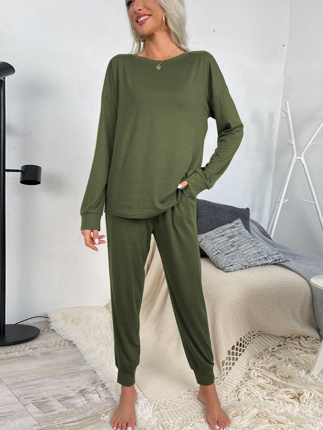 Lounge in Style: Round Neck Top and Drawstring Pants SetIndulge in Comfort and Style
 Upgrade your loungewear game with our Lounge in Style Set, featuring a chic Round Neck Top and ultra-comfortable Drawstring Pants. WhetLove Salve Round Neck Toplounge