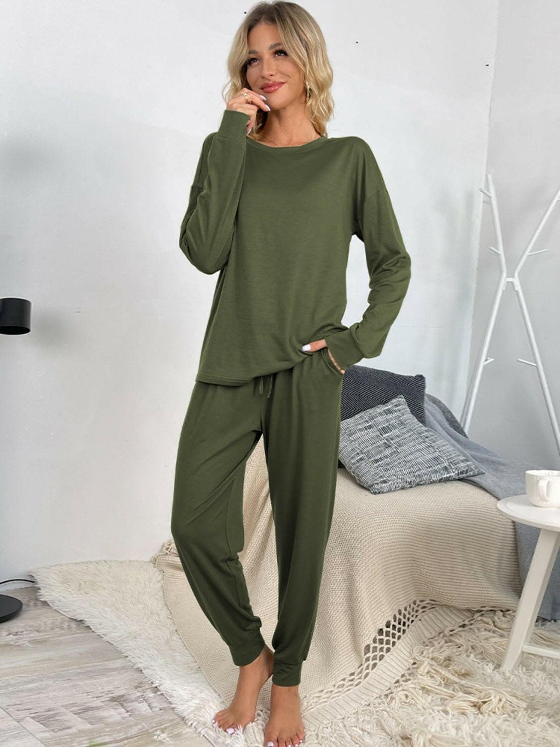 Lounge in Style: Round Neck Top and Drawstring Pants SetIndulge in Comfort and Style
 Upgrade your loungewear game with our Lounge in Style Set, featuring a chic Round Neck Top and ultra-comfortable Drawstring Pants. WhetLove Salve Round Neck Toplounge