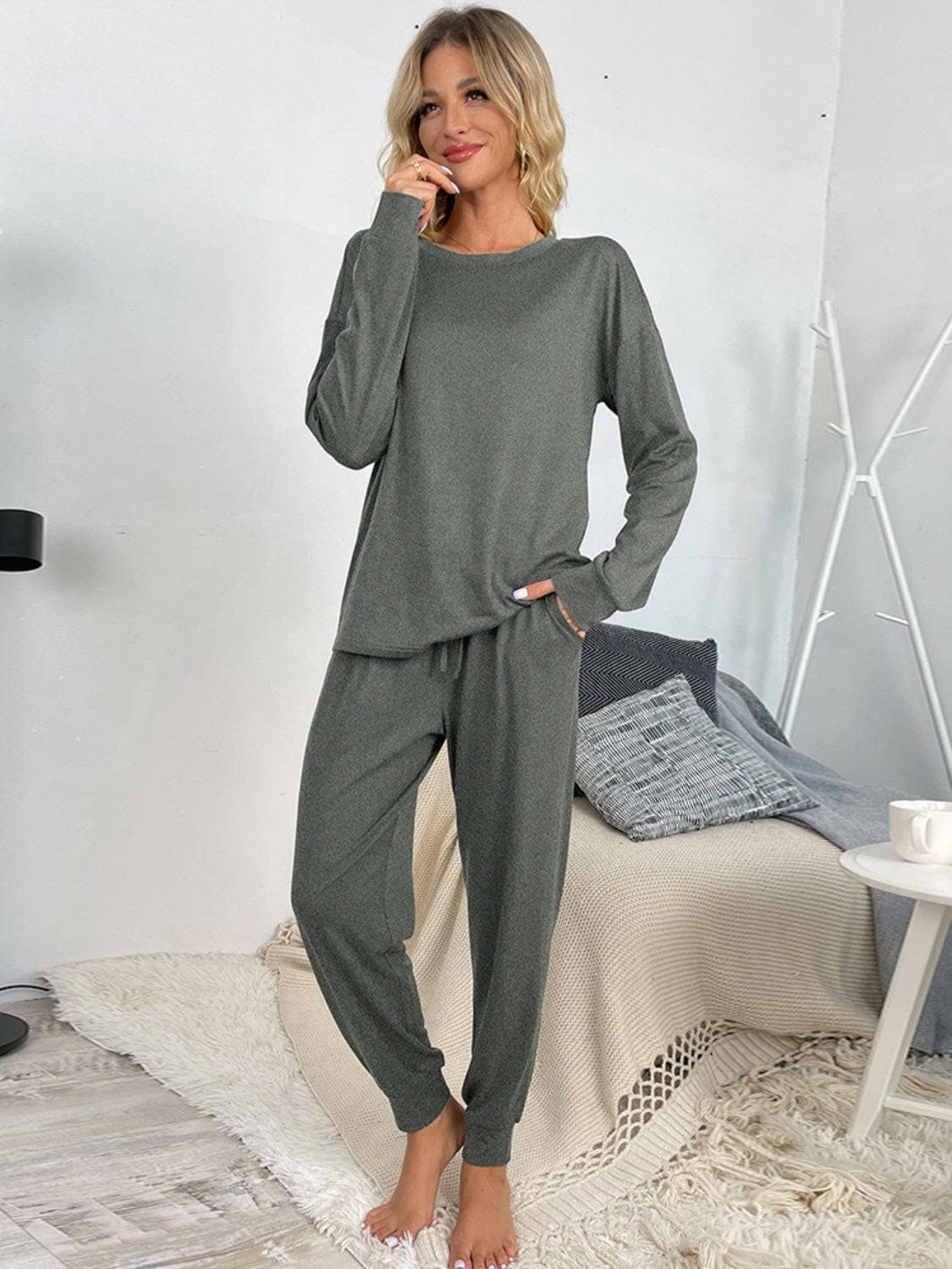 Lounge in Style: Round Neck Top and Drawstring Pants SetIndulge in Comfort and Style
 Upgrade your loungewear game with our Lounge in Style Set, featuring a chic Round Neck Top and ultra-comfortable Drawstring Pants. WhetLove Salve Round Neck Toplounge