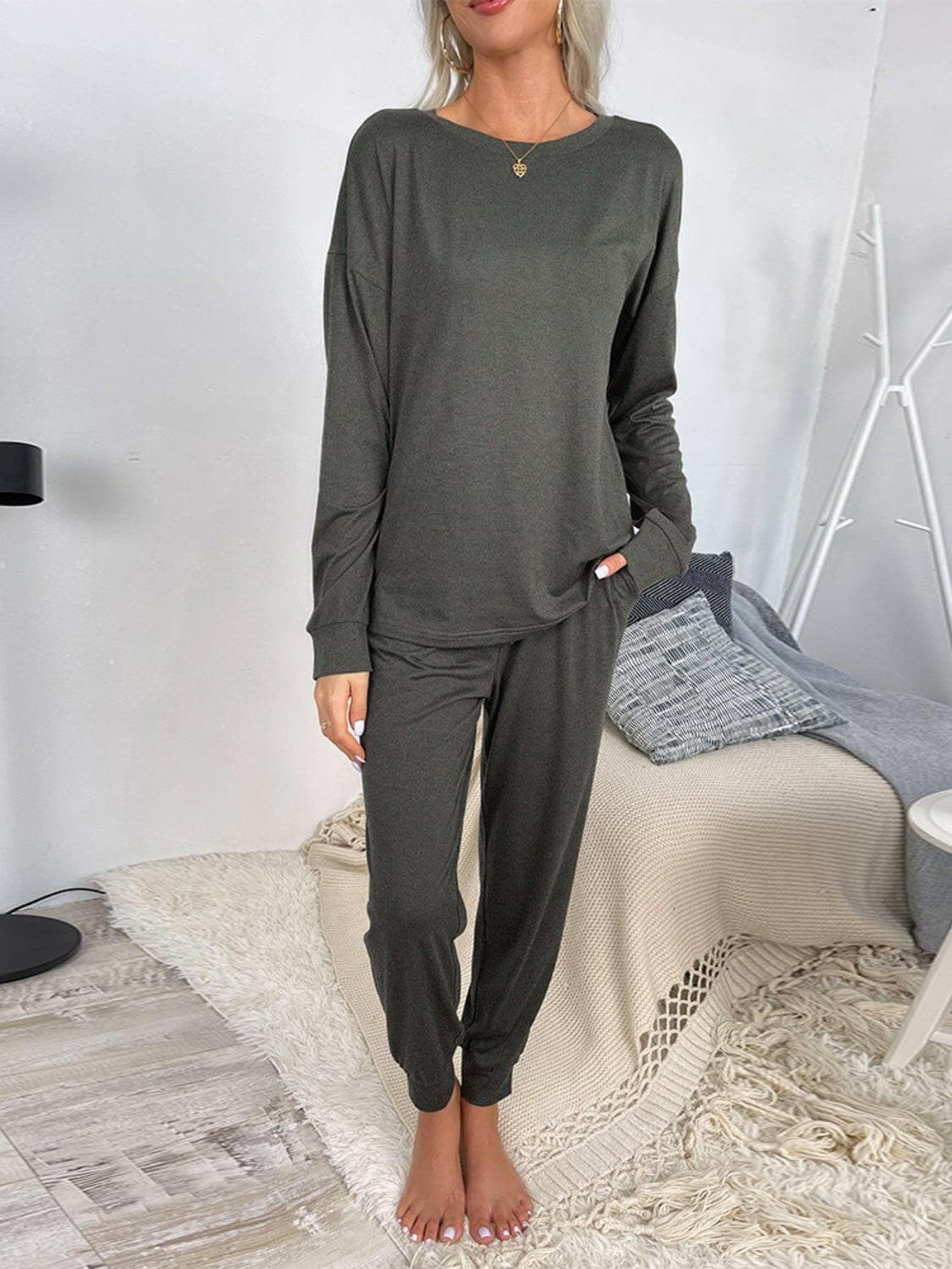 Lounge in Style: Round Neck Top and Drawstring Pants SetIndulge in Comfort and Style
 Upgrade your loungewear game with our Lounge in Style Set, featuring a chic Round Neck Top and ultra-comfortable Drawstring Pants. WhetLove Salve Round Neck Toplounge