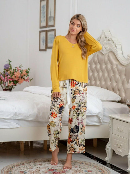 Stylish Comfort Lounge Set with Round Neck Top and Printed PantsUpgrade Your Loungewear Game
 Introducing our Comfort Chic Lounge Wear Set, the perfect blend of style and comfort for your everyday relaxation. This set includes a Love Salve Stylish Comfort Lounge Setlounge