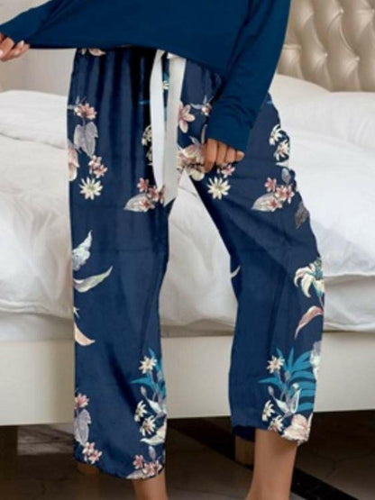 Stylish Comfort Lounge Set with Round Neck Top and Printed PantsUpgrade Your Loungewear Game
 Introducing our Comfort Chic Lounge Wear Set, the perfect blend of style and comfort for your everyday relaxation. This set includes a Love Salve Stylish Comfort Lounge Setlounge