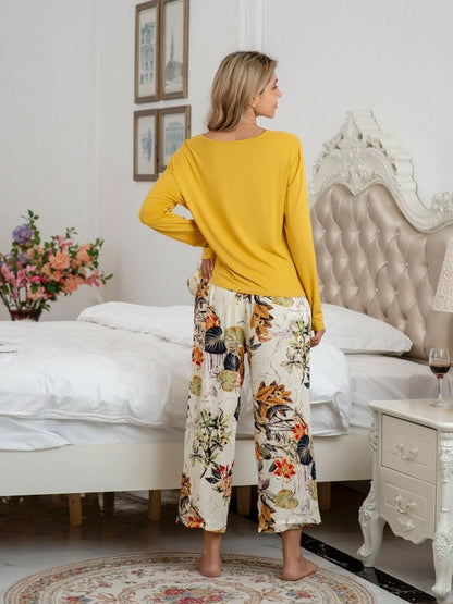 Stylish Comfort Lounge Set with Round Neck Top and Printed PantsUpgrade Your Loungewear Game
 Introducing our Comfort Chic Lounge Wear Set, the perfect blend of style and comfort for your everyday relaxation. This set includes a Love Salve Stylish Comfort Lounge Setlounge