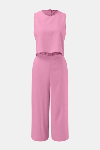 Casual Chic Two-Piece Set with Round Neck Top and Wide Leg PantsUpgrade Your Everyday Style with Our Casual Chic Two-Piece Set
 
 Effortlessly chic and versatile, this two-piece set is a must-have for your wardrobe.
 Featuring a Love Salve Round Neck Topjust arrived