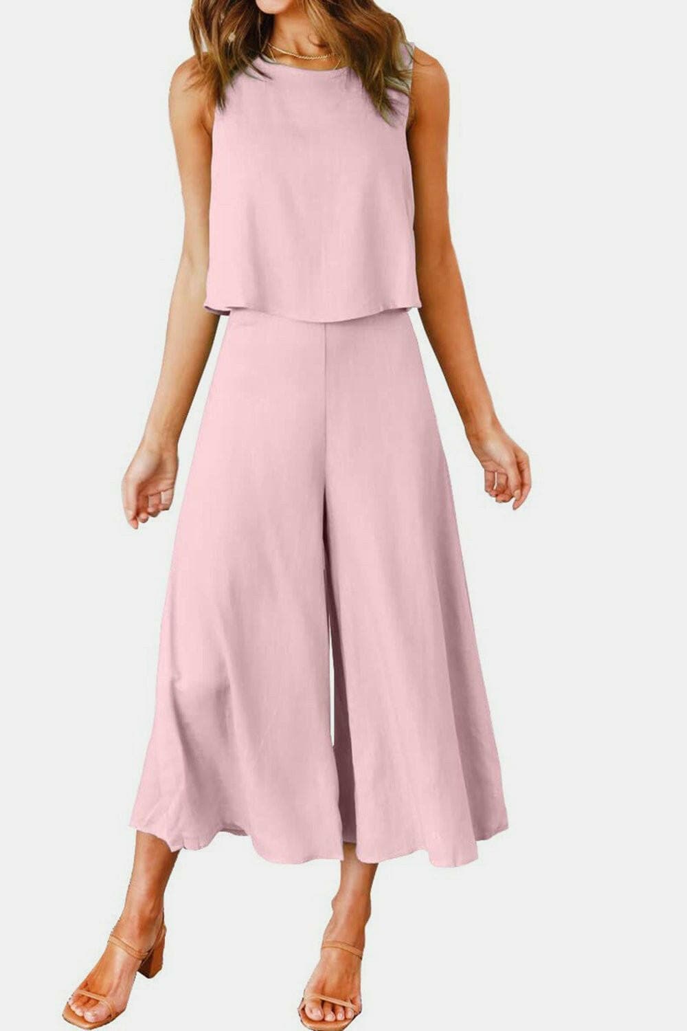 Casual Chic Two-Piece Set with Round Neck Top and Wide Leg PantsUpgrade Your Everyday Style with Our Casual Chic Two-Piece Set
 
 Effortlessly chic and versatile, this two-piece set is a must-have for your wardrobe.
 Featuring a Love Salve Round Neck Topjust arrived