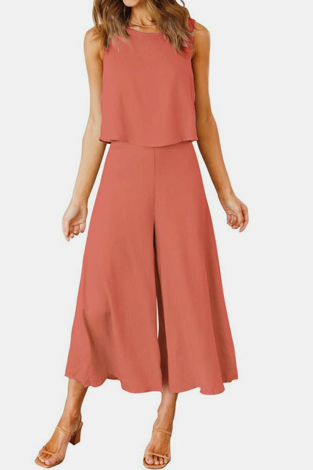 Casual Chic Two-Piece Set with Round Neck Top and Wide Leg PantsUpgrade Your Everyday Style with Our Casual Chic Two-Piece Set
 
 Effortlessly chic and versatile, this two-piece set is a must-have for your wardrobe.
 Featuring a Love Salve Round Neck Topjust arrived