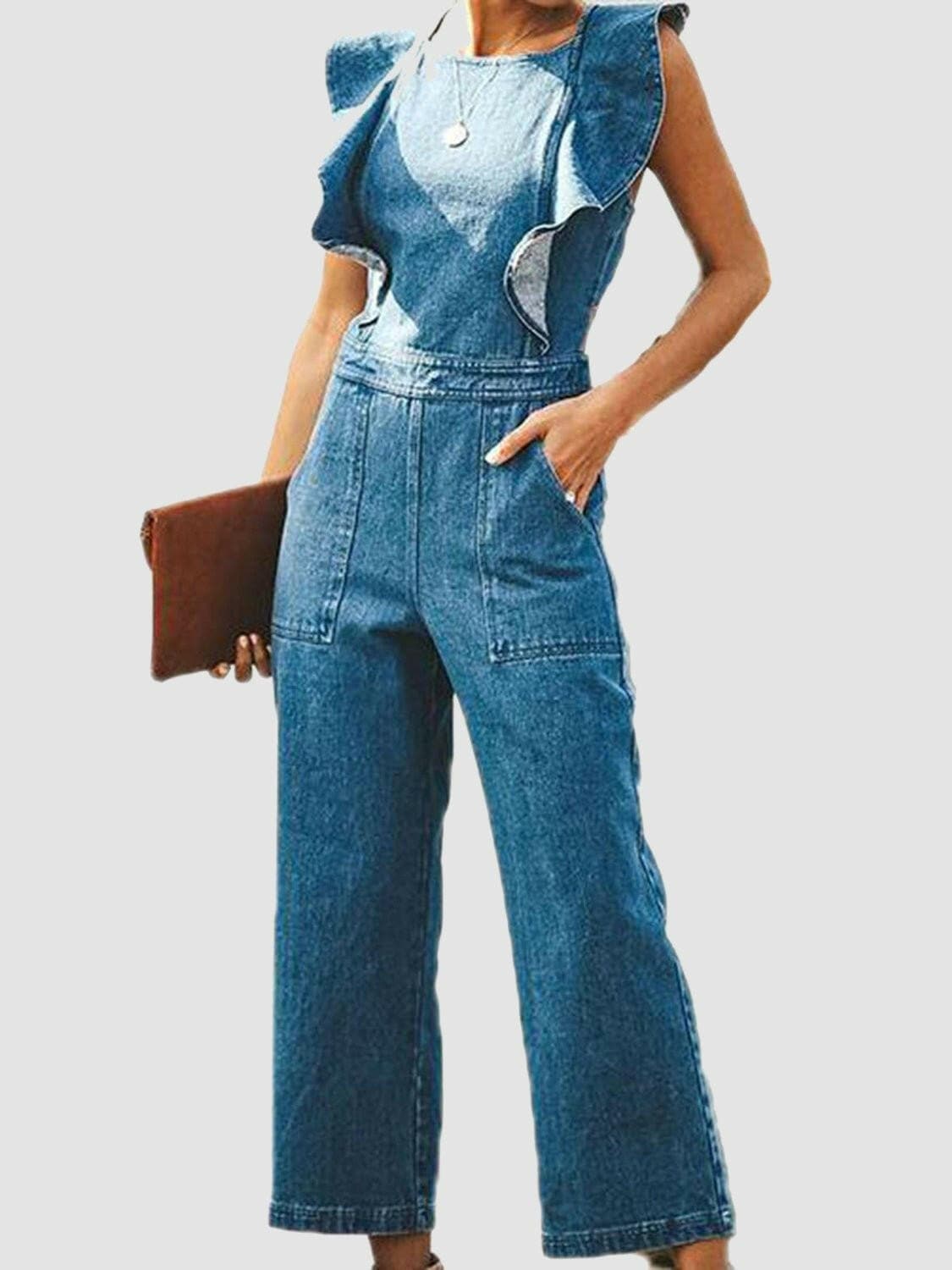 Ruffled denim jumpsuit with open back and no sleeves.