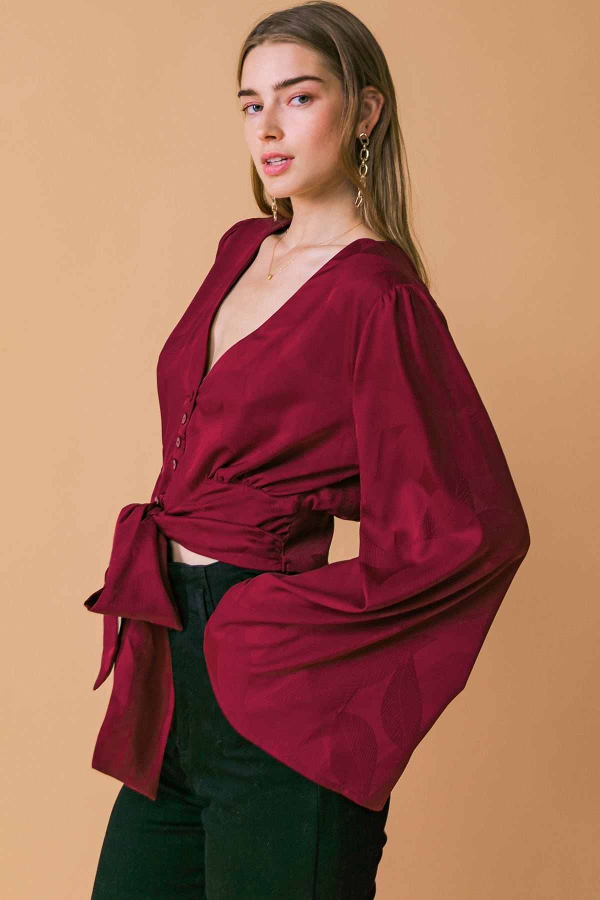 Flying Tomato THE RIGHT ADDITION WOVEN TOP, showing its comfortable drape and elegant flow on a model.