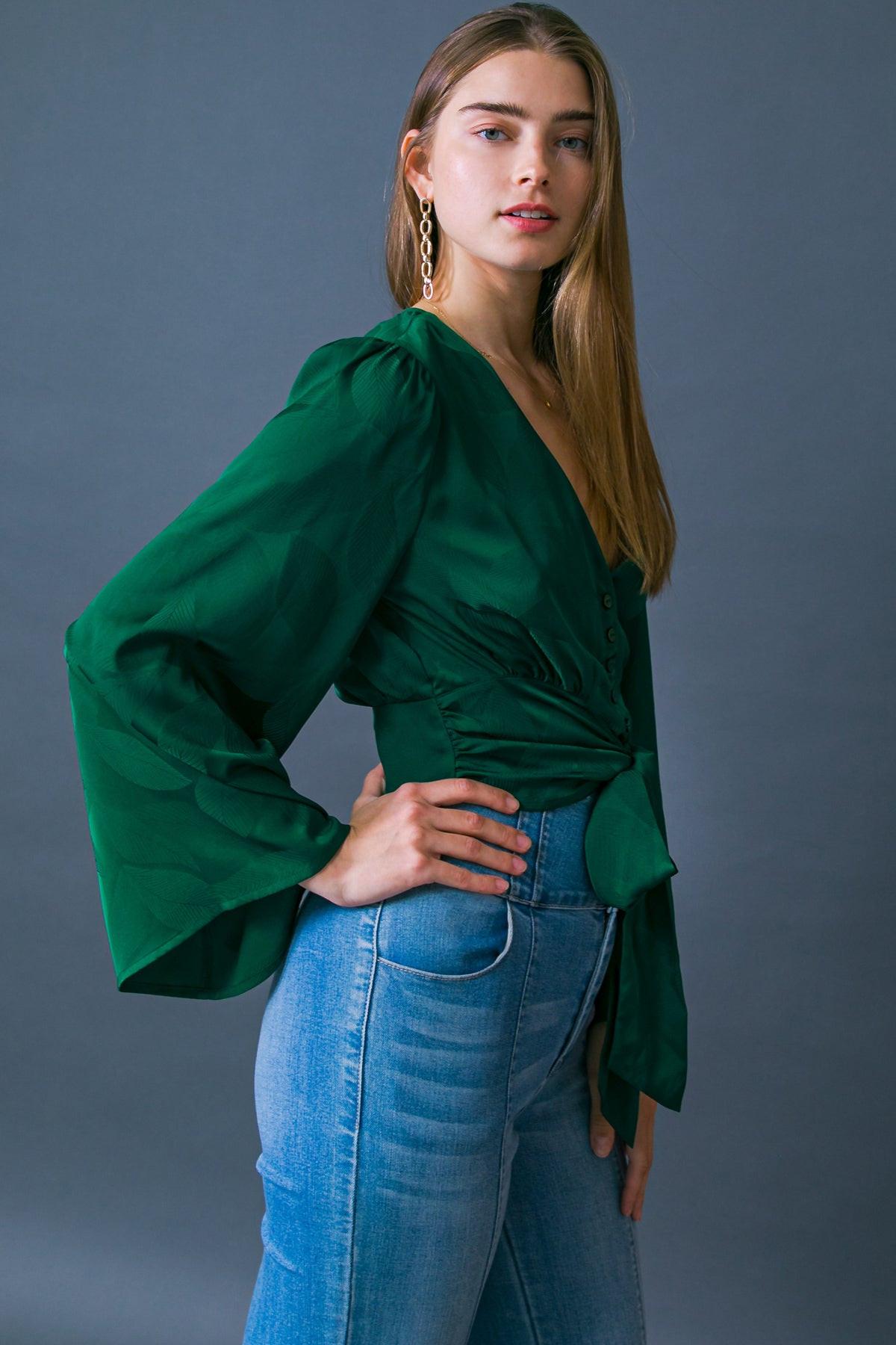 Hemline detail of Flying Tomato THE RIGHT ADDITION WOVEN TOP, revealing its meticulous construction and refined finish.