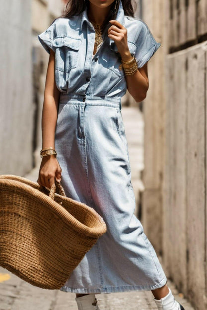 Stylish denim shirt dress with pockets, perfect for versatile fashion.