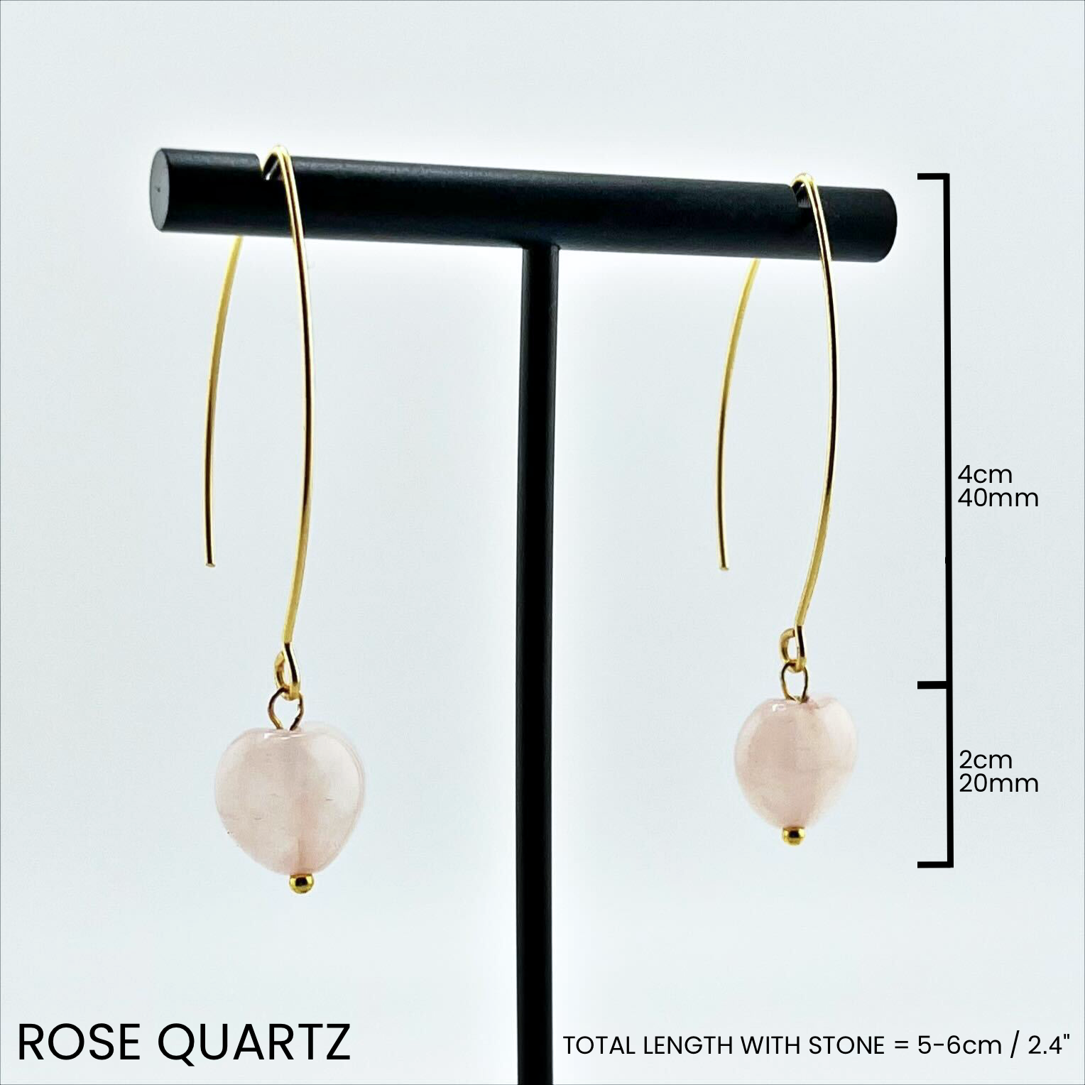 Katia Designs Small Stone Drop Earrings held gently in a hand, illustrating their petite size and lightweight feel for all-day comfort.