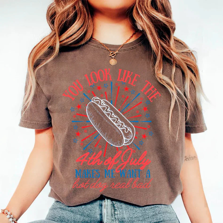 A person casually wearing the Adorb.co funny hot dog t-shirt, showing its relaxed fit for Independence Day events.