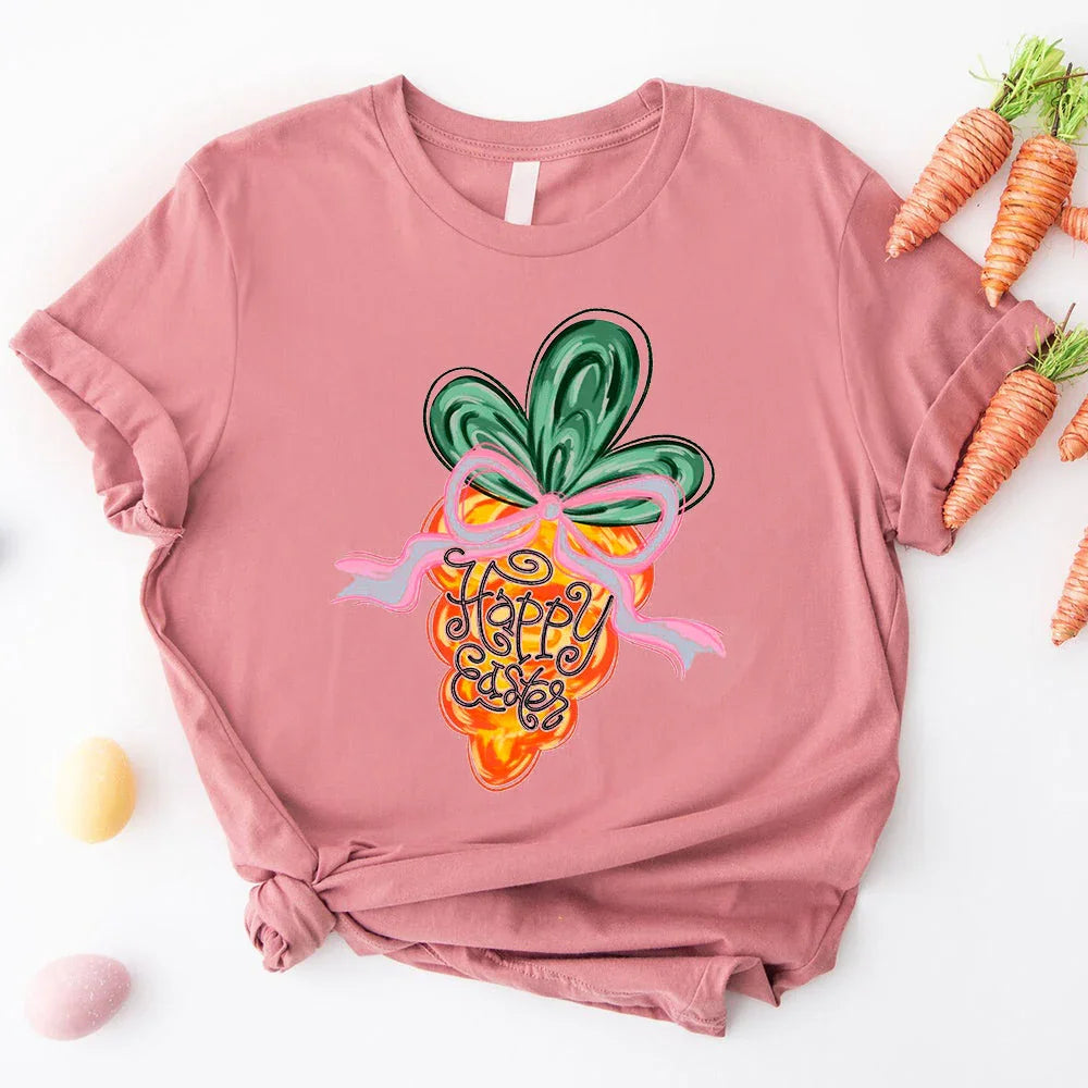 Adorb.co Happy Easter Carrot Coquette Tee in a flat lay, showcasing its charming design as a versatile addition to quality ap