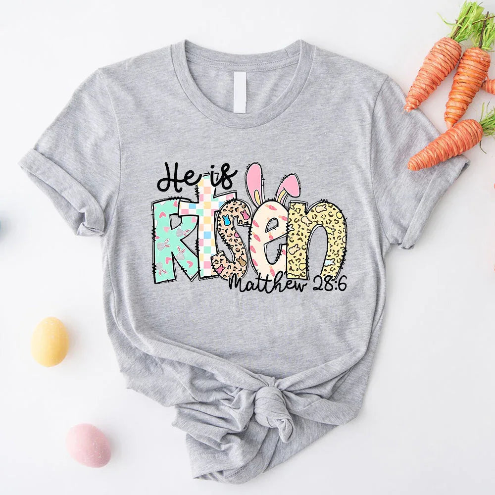 Adorb.co He is Risen Easter Inspirational Tee, showcasing the full graphic design on quality fabric for Christian apparel.