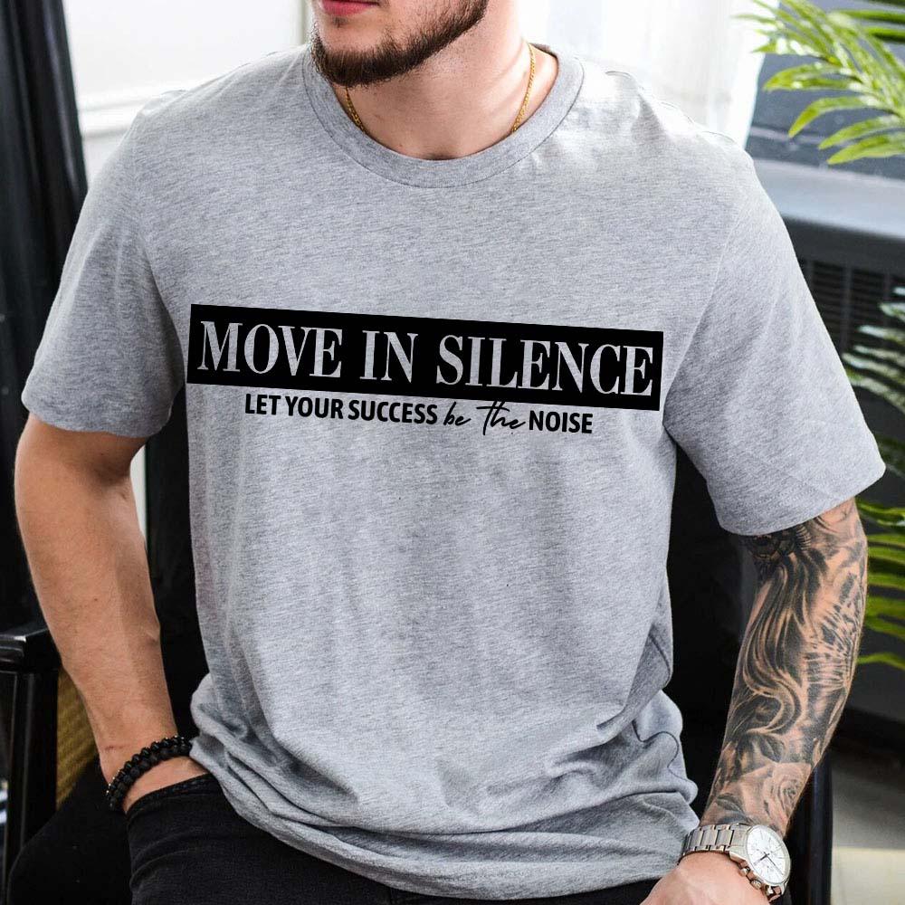 Adorb.co Move in Silence Inspirational Shirt, a comfortable cotton streetwear tee worn by a model, showcasing its unisex fit.