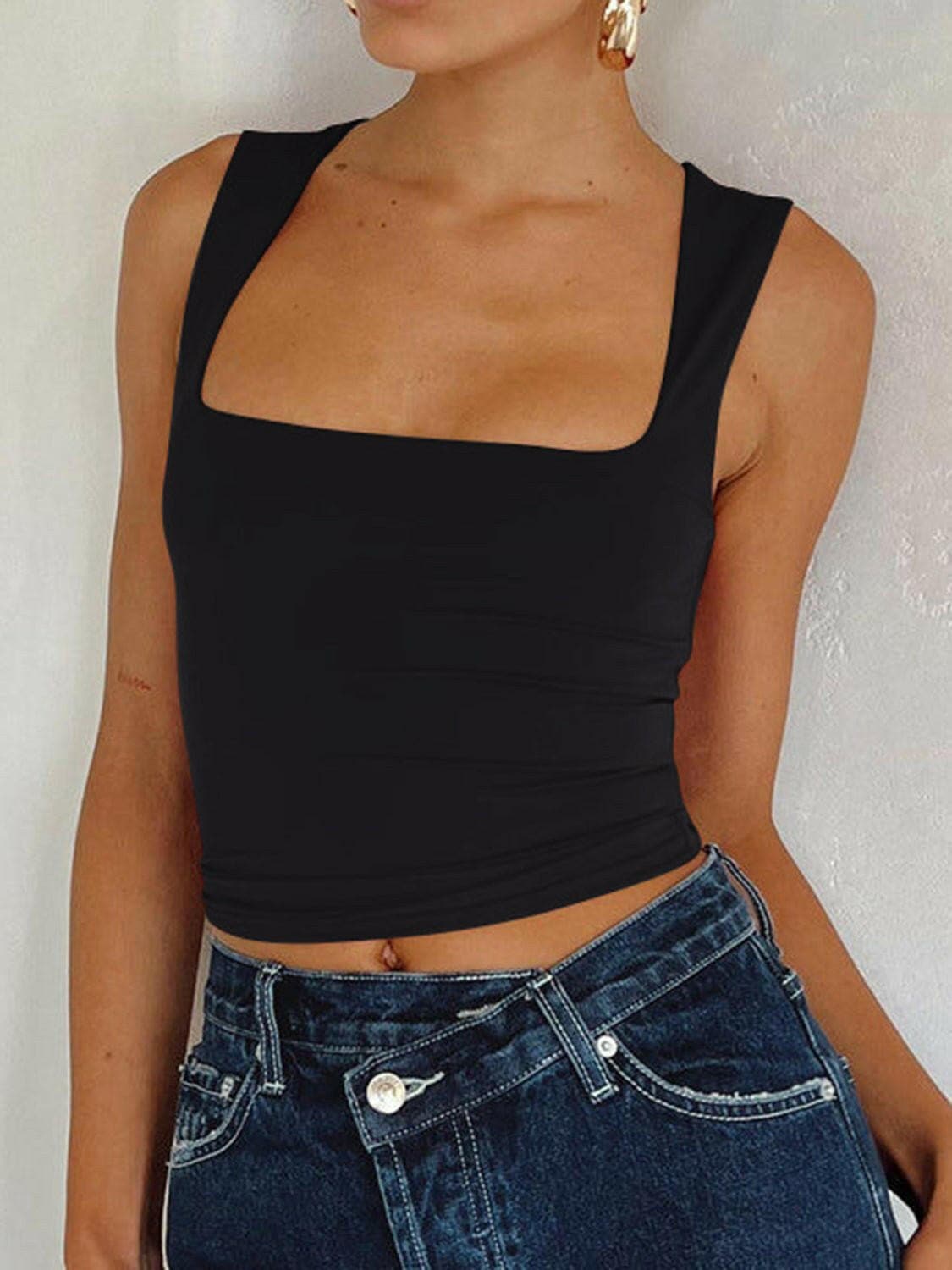 Square Neck Wide Strap Tank TopUpgrade Your Wardrobe with our Square Neck Wide Strap Tank Top!
 
 
Basic Style: This tank top features a classic and versatile design that can be effortlessly styleLove Salve Square Neck Wide Strap Tank Topjust arrived