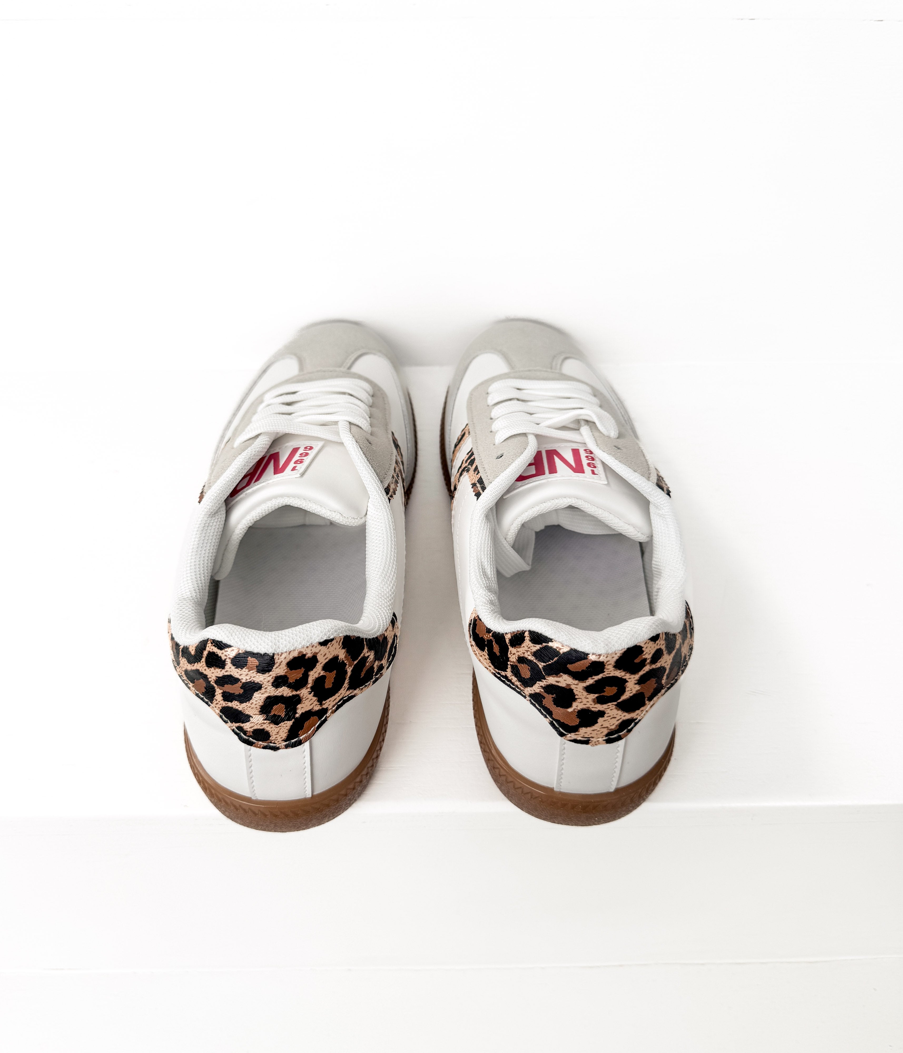 Stockholm White Leopard Sneakers With Metallic Heel Accents Naughty Monkey