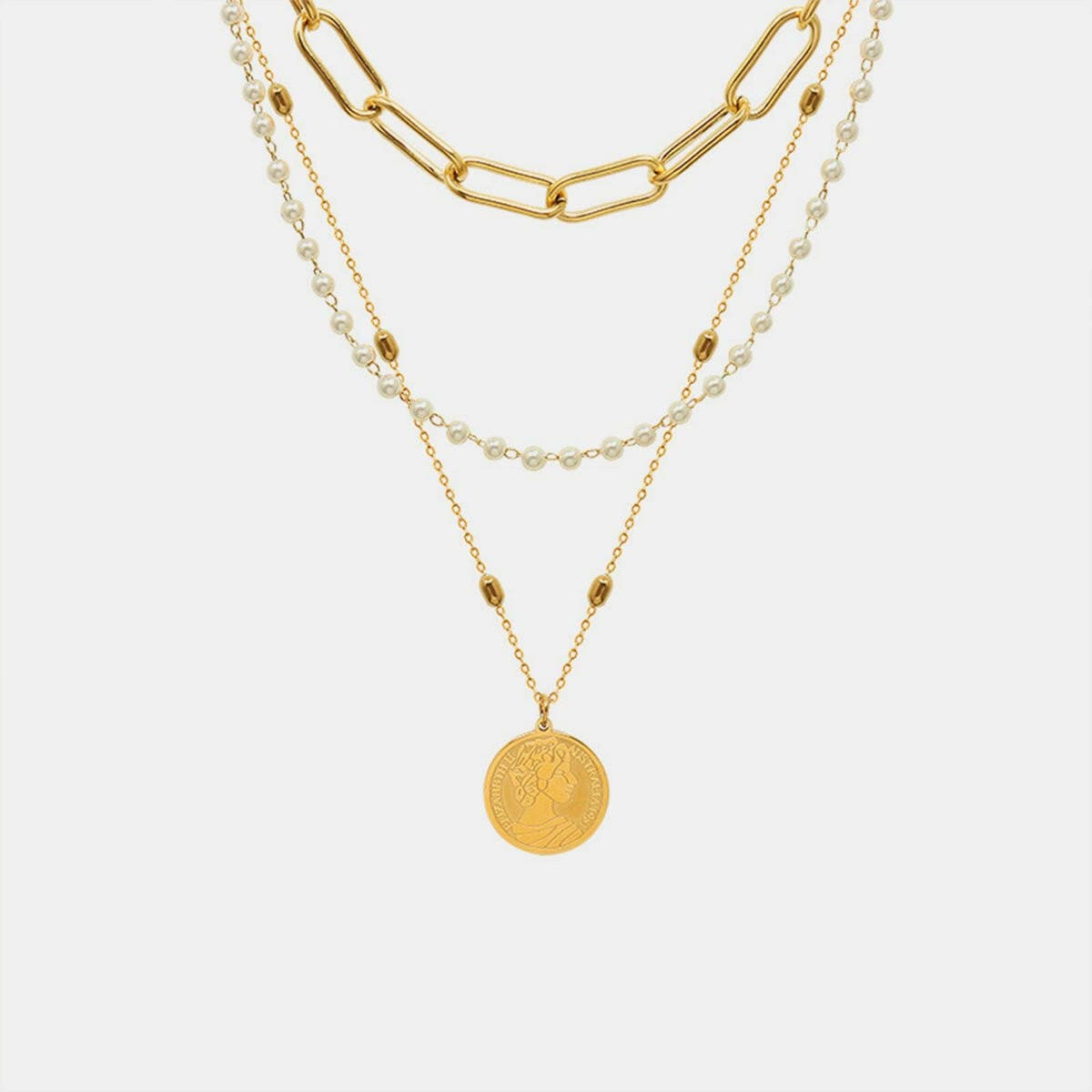 Three-Layered Synthetic Pearl Necklace with Titanium Steel ChainThree-Layered Synthetic Pearl Necklace with Titanium Steel Chain
 Indulge in sophistication and elevate your style with our Three-Layered Synthetic Pearl Necklace. TLove Salve -Layered Synthetic Pearl Necklacejust arrived