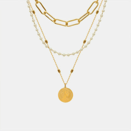 Three-Layered Synthetic Pearl Necklace with Titanium Steel ChainThree-Layered Synthetic Pearl Necklace with Titanium Steel Chain
 Indulge in sophistication and elevate your style with our Three-Layered Synthetic Pearl Necklace. TLove Salve -Layered Synthetic Pearl Necklacejust arrived