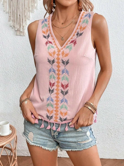 Tassel Detail V-Neck Sheer Tank TopExperience Effortless Elegance with Our Tassel Detail V-Neck Sheer Tank Top
 Indulge in sheer sophistication with our Tassel Detail V-Neck Sheer Tank Top, a versatilLove Salve -Neck Sheer Tank Topjust arrived