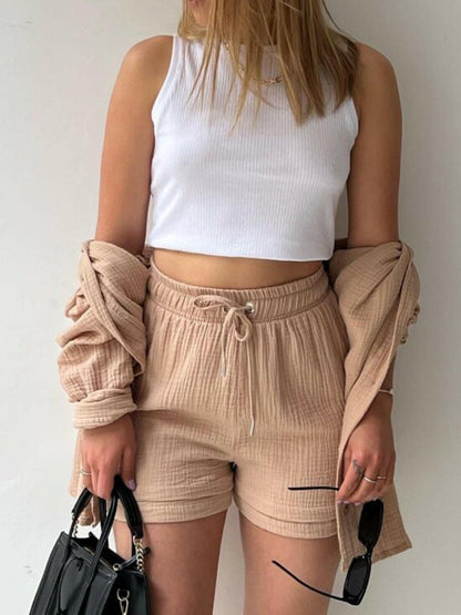 Chic Textured Shirt and Drawstring Shorts EnsembleChic Textured Shirt and Drawstring Shorts Ensemble
 Upgrade your style effortlessly with our chic textured shirt and drawstring shorts ensemble. Embrace a modern andLove Salve Chic Textured ShirtColor