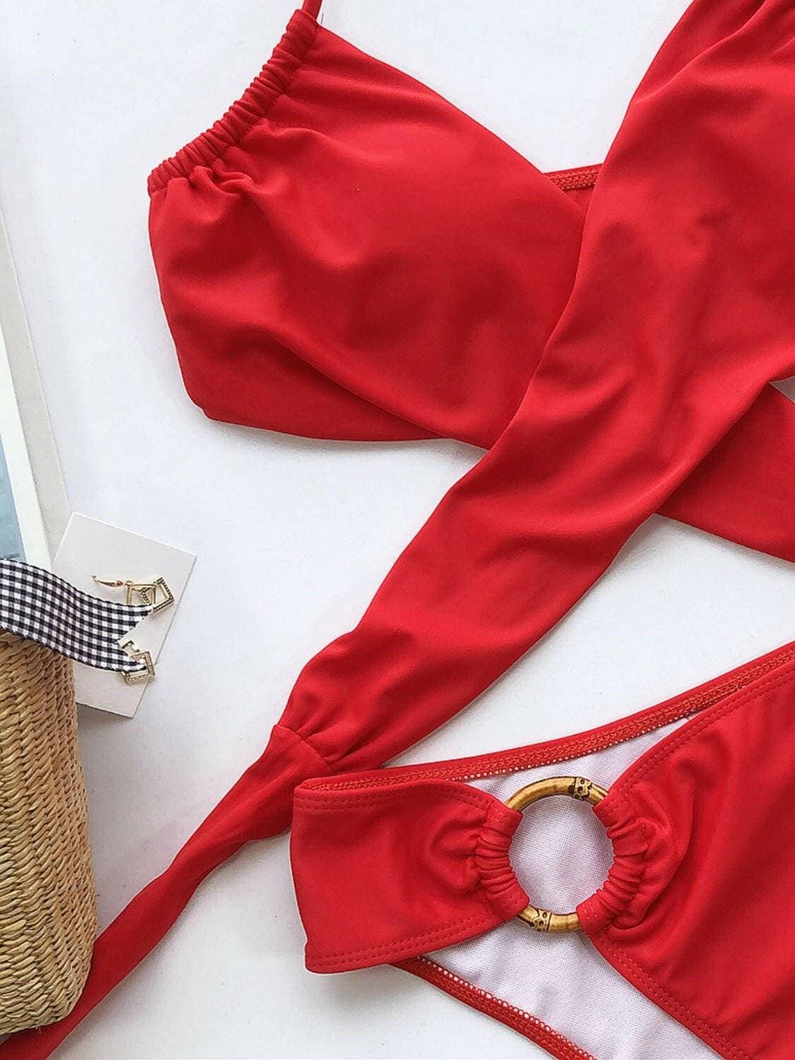 Halter Neck Two-Piece Bikini EnsembleHalter Neck Two-Piece Bikini Ensemble
 Make a statement on the beach with our Halter Neck Two-Piece Bikini Ensemble, designed to elevate your beach style effortlesslLove Salve -Piece Bikini EnsembleApparel