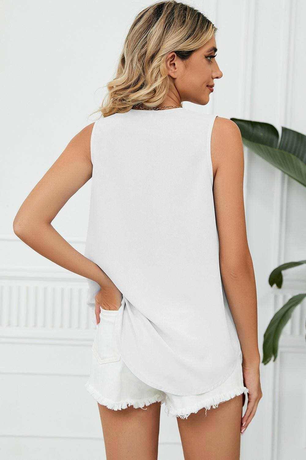 Elegant V-Neck Sleeveless Top with Wide StrapsExperience Timeless Elegance
 Step into sophistication with our Elegant V-Neck Sleeveless Top with Wide Straps. Crafted from luxurious 100% polyester, this top offerLove Salve -Neck Sleeveless TopApparel