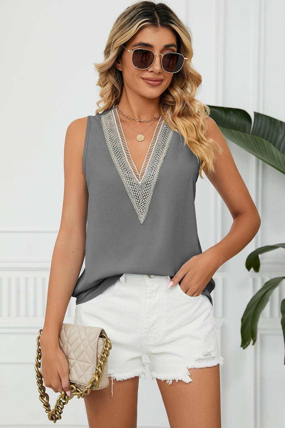 Elegant V-Neck Sleeveless Top with Wide StrapsExperience Timeless Elegance
 Step into sophistication with our Elegant V-Neck Sleeveless Top with Wide Straps. Crafted from luxurious 100% polyester, this top offerLove Salve -Neck Sleeveless TopApparel