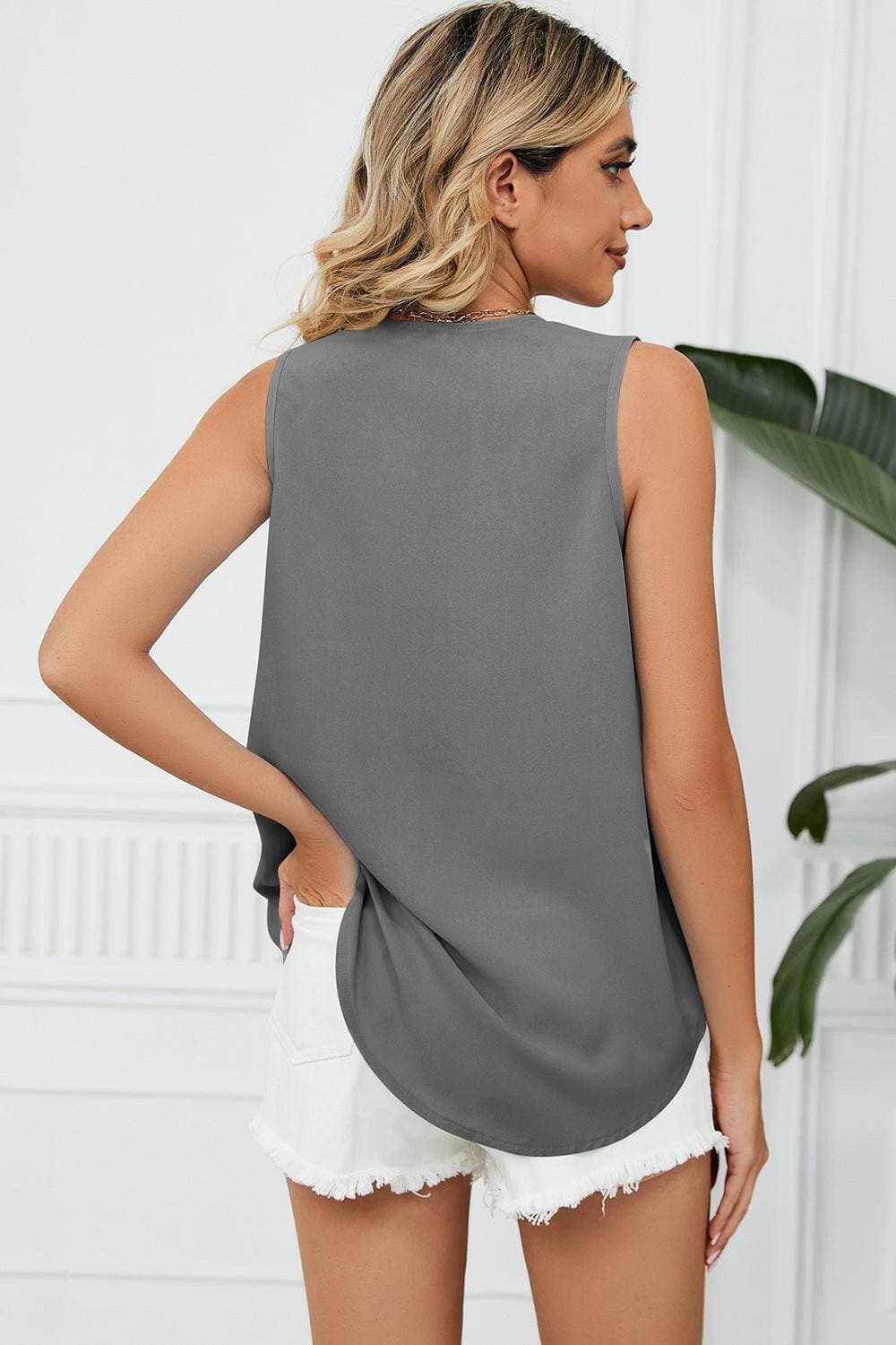 Elegant V-Neck Sleeveless Top with Wide StrapsExperience Timeless Elegance
 Step into sophistication with our Elegant V-Neck Sleeveless Top with Wide Straps. Crafted from luxurious 100% polyester, this top offerLove Salve -Neck Sleeveless TopApparel