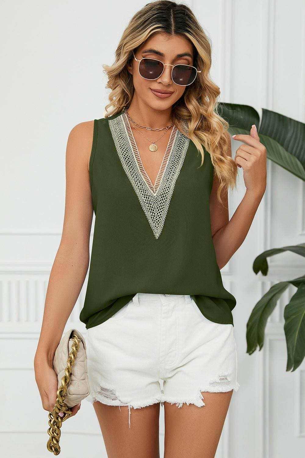 Elegant V-Neck Sleeveless Top with Wide StrapsExperience Timeless Elegance
 Step into sophistication with our Elegant V-Neck Sleeveless Top with Wide Straps. Crafted from luxurious 100% polyester, this top offerLove Salve -Neck Sleeveless TopApparel