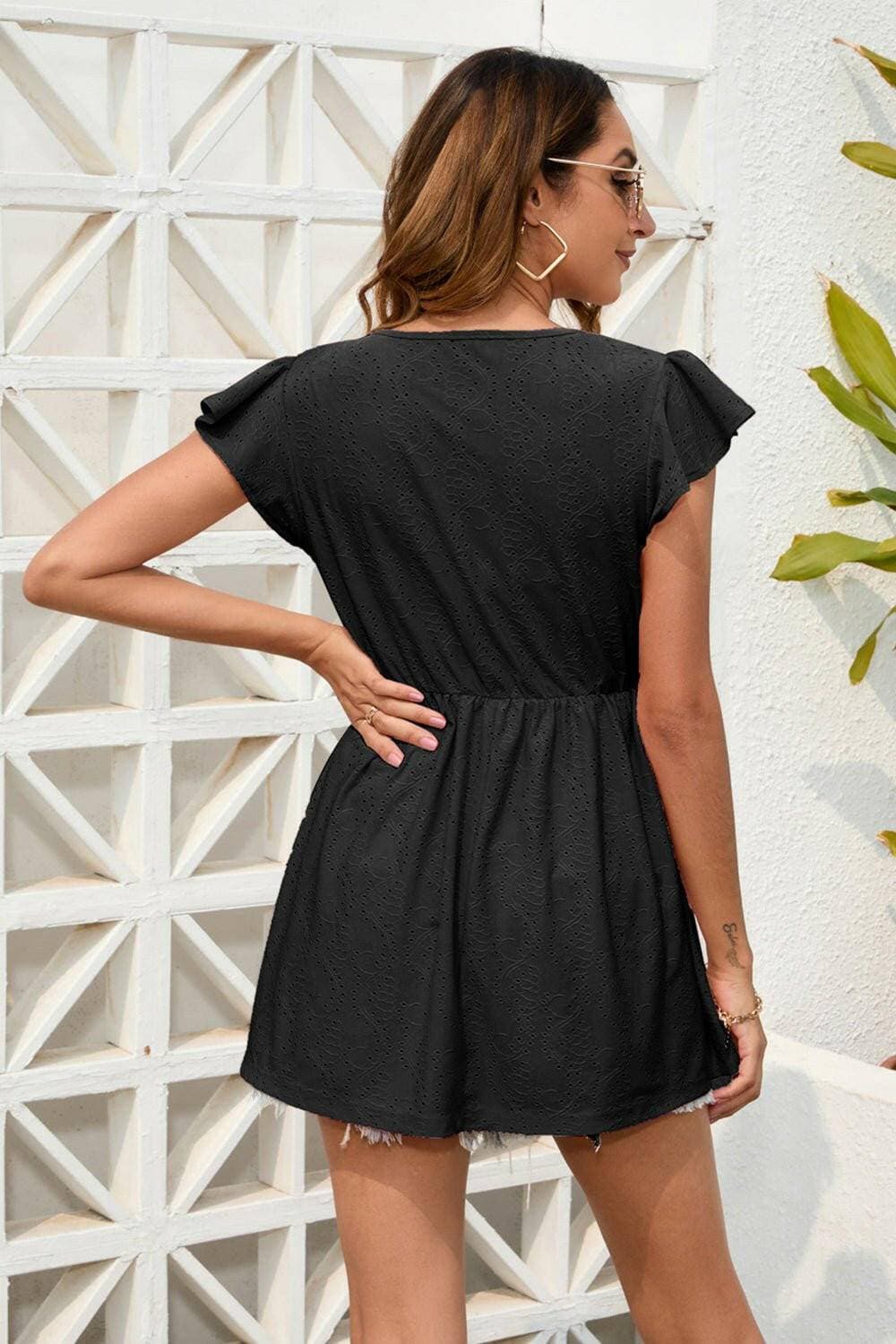 Elegant Embellished V-Neck Cap Sleeve Blouse with Button DetailElegant Embellished V-Neck Cap Sleeve Blouse with Button Detail
 Step into sophistication with our elegant V-Neck Blouse featuring exquisite button detailing. ElevatLove Salve -Neck Cap Sleeve BlouseApparel