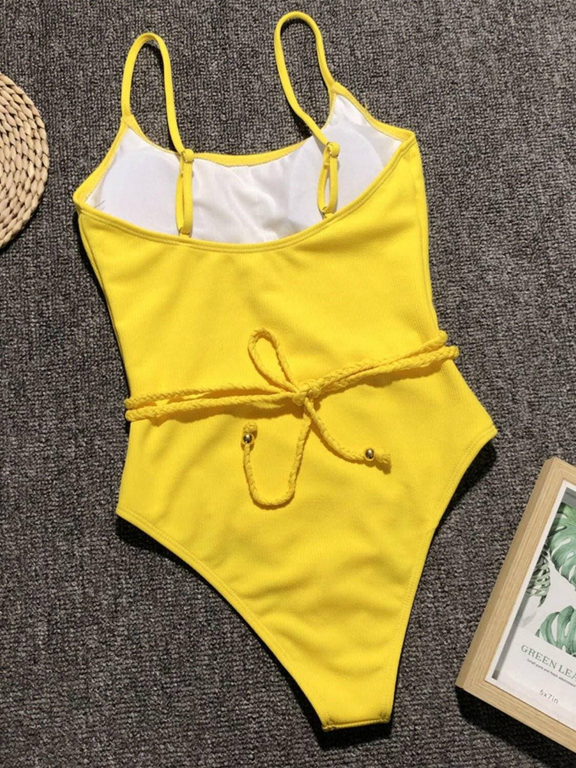 Ruffled One-Piece Swimsuit with Adjustable Padding and Wire-Free DesigRuffled One-Piece Swimsuit with Adjustable Padding and Wire-Free Design
 Indulge in the perfect blend of comfort and elegance with our Ruffled One-Piece Swimsuit.
 
Love Salve -Piece SwimsuitApparel