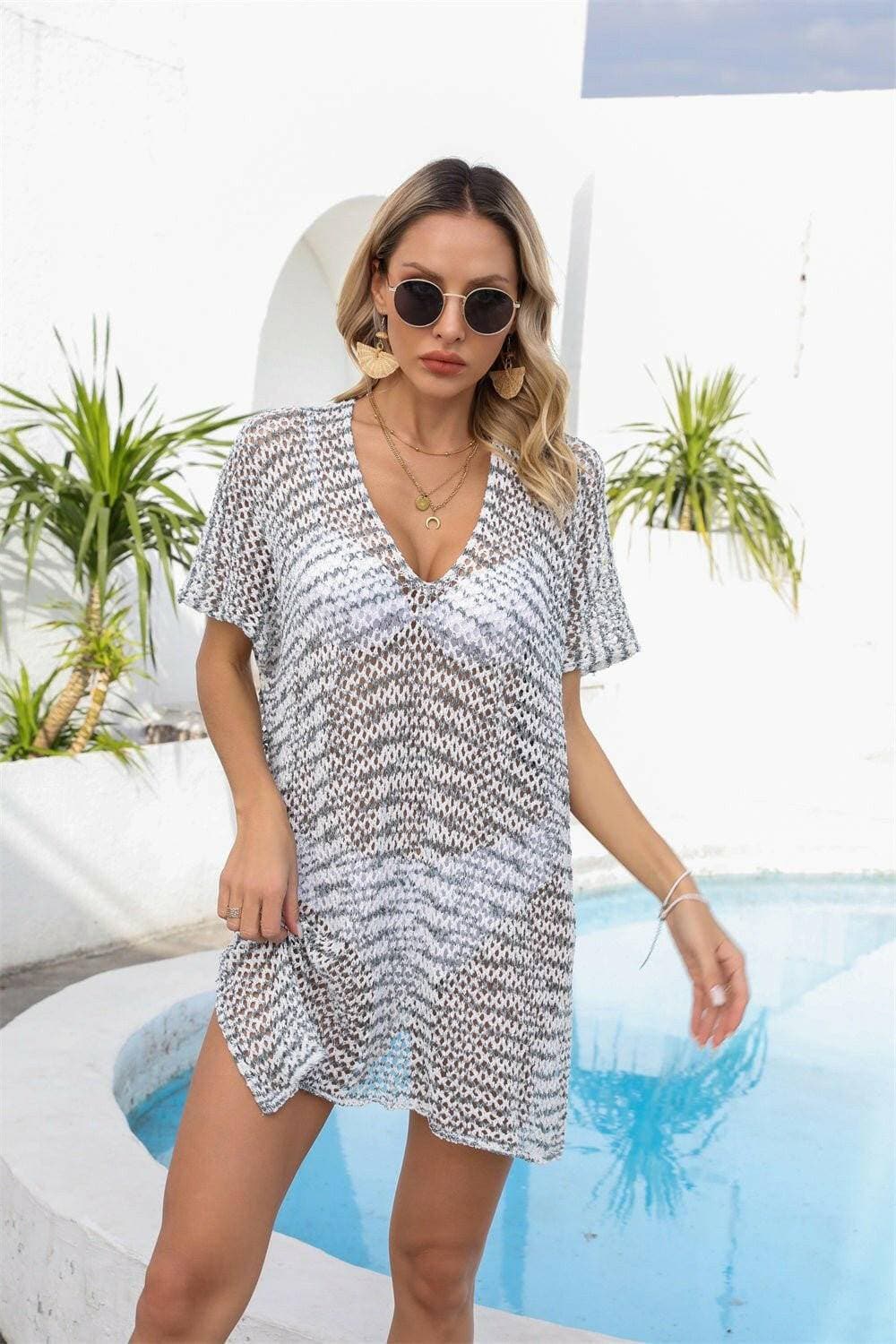 Sheer V-Neck Beach Cover-Up with Exquisite DetailSheer V-Neck Beach Cover-Up with Exquisite Detail
 Step into Beach Chic sophistication with our Sheer V-Neck Cover-Up
 Main Features:
 
 
Elevated Design: Stand out Love Salve -Neck Beach Cover-Apparel