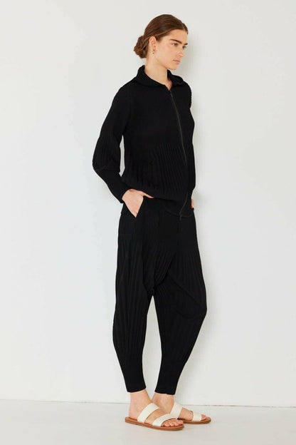 Aladdin Pleated Trousers: Unisex Bohemian Fantasy PantsStep into a Magical World
 Transform your wardrobe with our Aladdin Pleated Trousers, designed for those who dare to embrace a unique and enchanting style.

 Unique Love Salve Unisex Bohemian Fantasy Pants