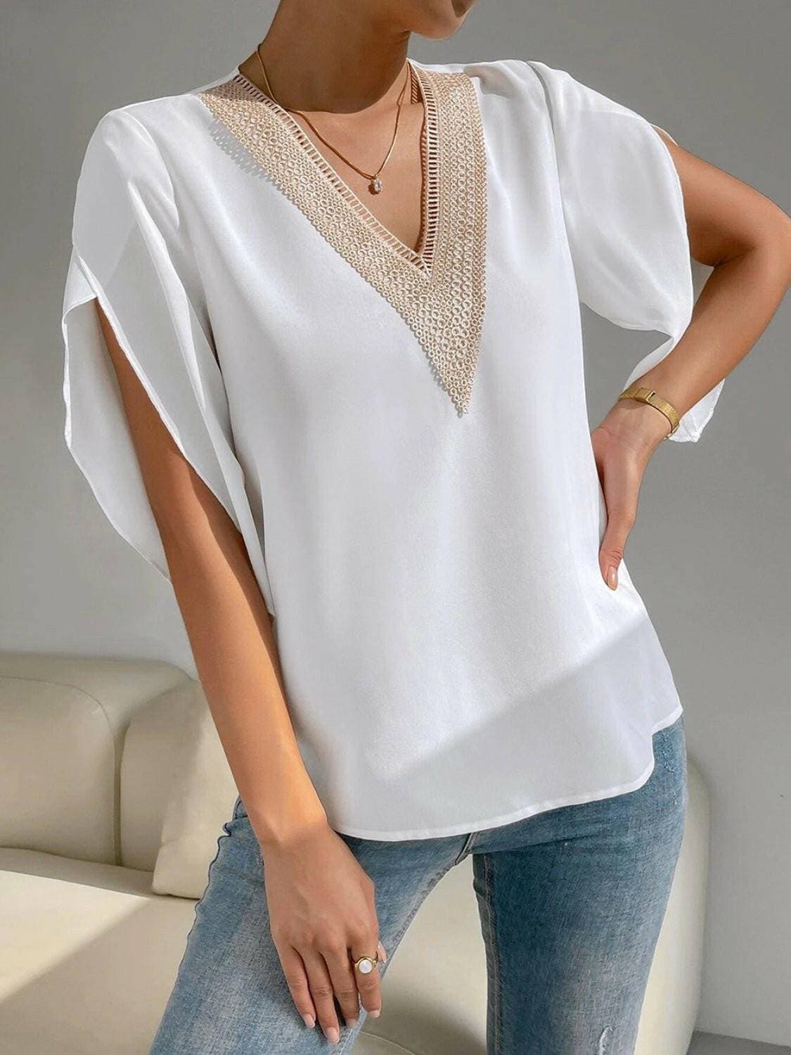 Elegant v-neck short sleeve blouse in white, perfect for versatile occasions.