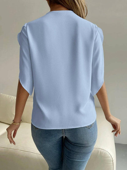 Elegant V-Neck Blouse with Short SleevesUpgrade Your Wardrobe with Style and Comfort
 Introducing our Elegant V-Neck Blouse with Short Sleeves, the perfect blend of sophistication and ease. Whether it's a Love Salve -Neck BlouseColor