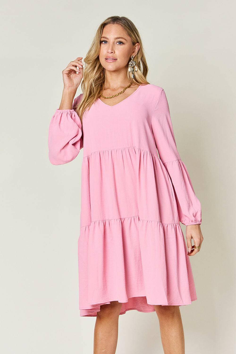 Double Vision V-Neck Balloon Sleeve Tiered DressDouble Vision V-Neck Balloon Sleeve Tiered Dress
 Step into the spotlight with our Double Vision V-Neck Balloon Sleeve Tiered Dress, a masterpiece designed to turn hLove Salve -Neck Balloon Sleeve Tiered DressColor