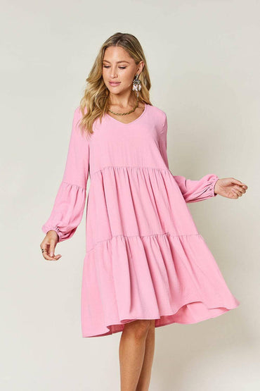 Double Vision V-Neck Balloon Sleeve Tiered DressDouble Vision V-Neck Balloon Sleeve Tiered Dress
 Step into the spotlight with our Double Vision V-Neck Balloon Sleeve Tiered Dress, a masterpiece designed to turn hLove Salve -Neck Balloon Sleeve Tiered DressColor