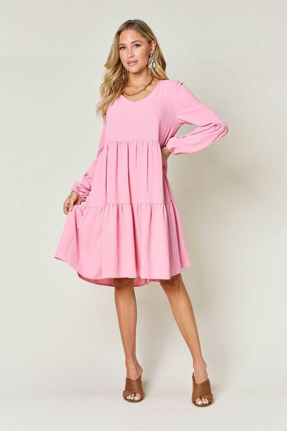 Double Vision V-Neck Balloon Sleeve Tiered DressDouble Vision V-Neck Balloon Sleeve Tiered Dress
 Step into the spotlight with our Double Vision V-Neck Balloon Sleeve Tiered Dress, a masterpiece designed to turn hLove Salve -Neck Balloon Sleeve Tiered DressColor