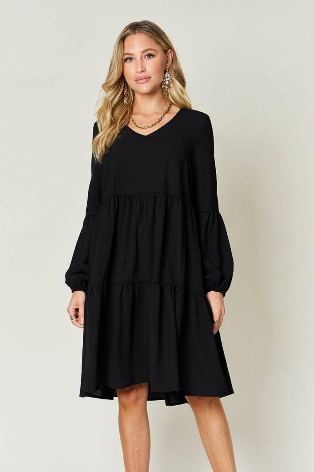 Double Vision V-Neck Balloon Sleeve Tiered DressDouble Vision V-Neck Balloon Sleeve Tiered Dress
 Step into the spotlight with our Double Vision V-Neck Balloon Sleeve Tiered Dress, a masterpiece designed to turn hLove Salve -Neck Balloon Sleeve Tiered DressColor