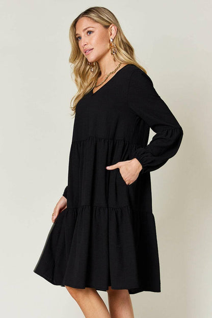 Double Vision V-Neck Balloon Sleeve Tiered DressDouble Vision V-Neck Balloon Sleeve Tiered Dress
 Step into the spotlight with our Double Vision V-Neck Balloon Sleeve Tiered Dress, a masterpiece designed to turn hLove Salve -Neck Balloon Sleeve Tiered DressColor