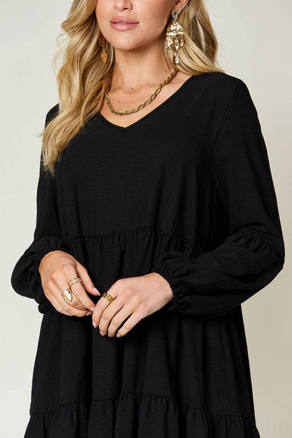 Double Vision V-Neck Balloon Sleeve Tiered DressDouble Vision V-Neck Balloon Sleeve Tiered Dress
 Step into the spotlight with our Double Vision V-Neck Balloon Sleeve Tiered Dress, a masterpiece designed to turn hLove Salve -Neck Balloon Sleeve Tiered DressColor