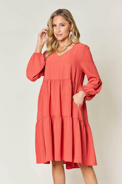 Double Vision V-Neck Balloon Sleeve Tiered DressDouble Vision V-Neck Balloon Sleeve Tiered Dress
 Step into the spotlight with our Double Vision V-Neck Balloon Sleeve Tiered Dress, a masterpiece designed to turn hLove Salve -Neck Balloon Sleeve Tiered DressColor